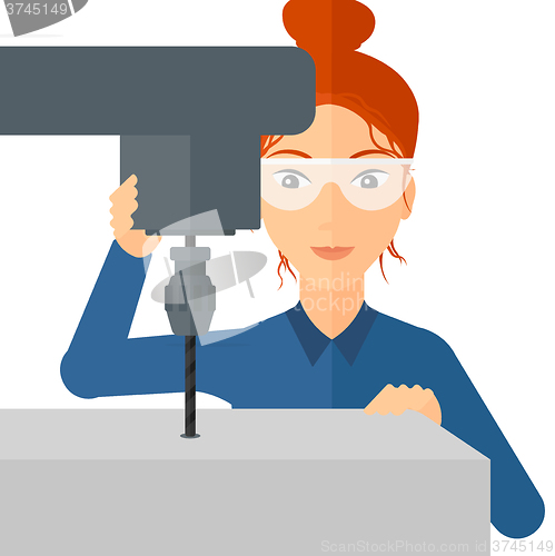 Image of Woman working with boring mill.