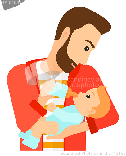 Image of Man feeding baby.