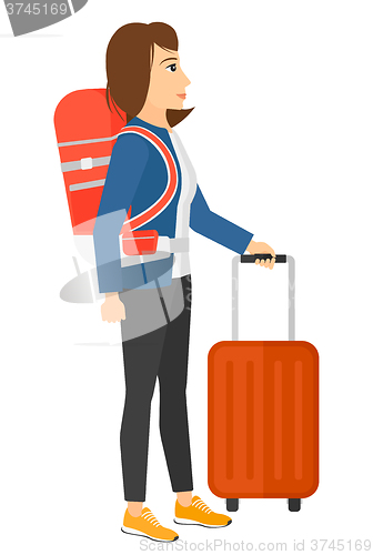 Image of Woman with bzckpack and briefcase.