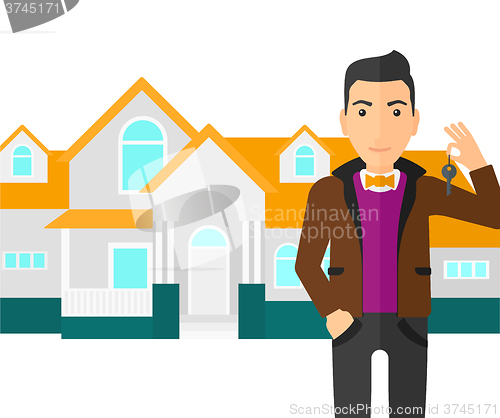 Image of Real estate agent with key.