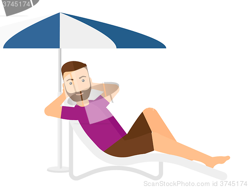 Image of Man sitting in chaise longue.