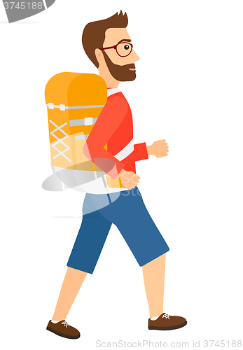 Image of Man with backpack hiking.