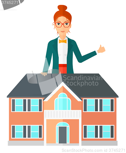 Image of Real estate agent showing thumb up.