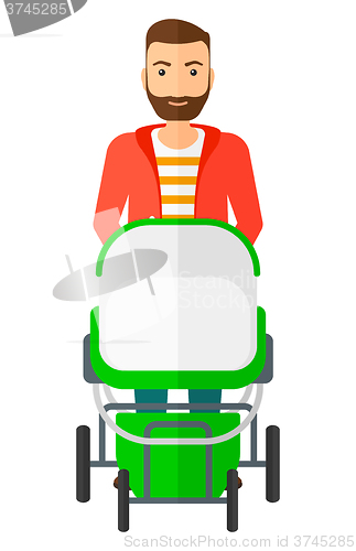 Image of Man pushing pram.