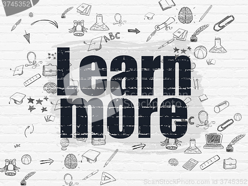 Image of Studying concept: Learn More on wall background