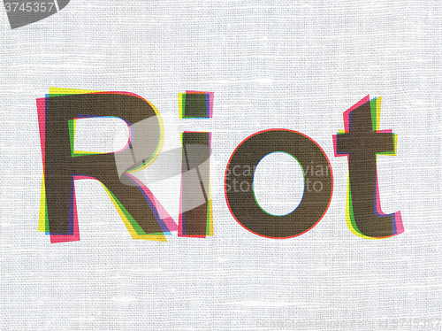 Image of Politics concept: Riot on fabric texture background
