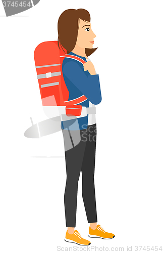 Image of Woman with backpack hiking.
