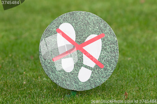 Image of Do not step on grass sign