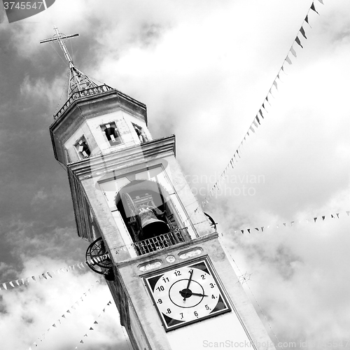 Image of ancien clock tower in italy europe old  stone and bell