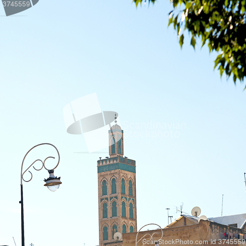 Image of old brick tower in morocco africa village and the sky