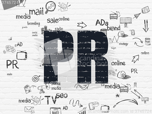 Image of Advertising concept: PR on wall background