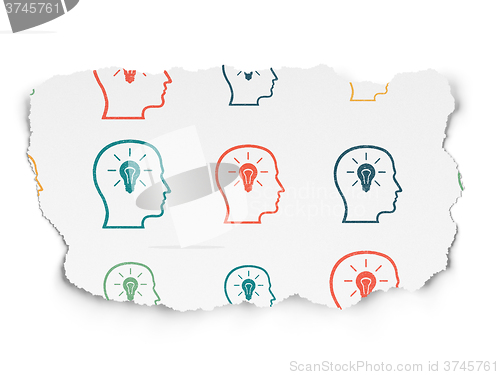 Image of Information concept: Head With Lightbulb icons on Torn Paper background