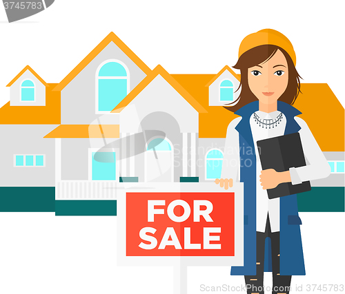 Image of Real estate agent offering house.