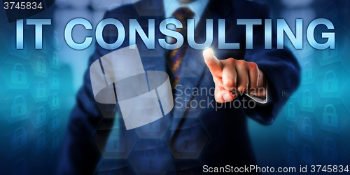 Image of Business Manager Pressing IT CONSULTING Onscreen