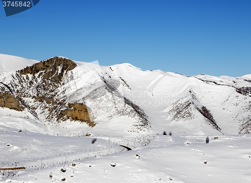 Image of Snowy winter mountains at nice sun morning