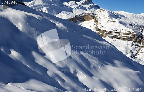 Image of Off-piste slope at sun evening