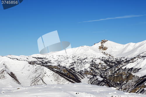 Image of Snowy winter mountains at nice sun day