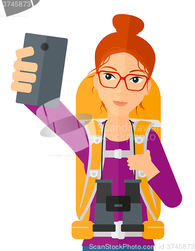 Image of Woman making selfie.