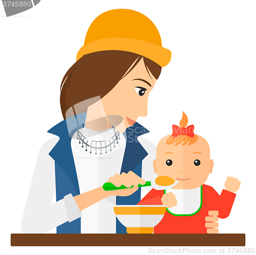 Image of Woman feeding baby.