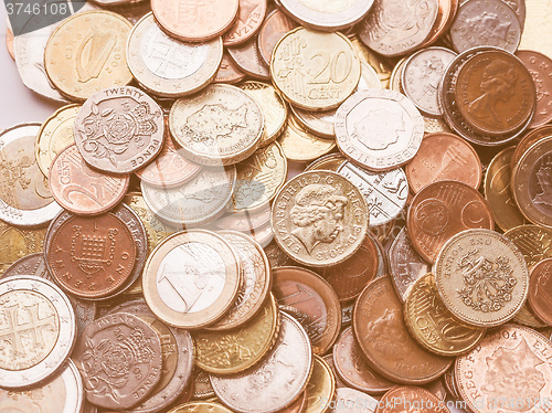 Image of  Euro and Pounds coins vintage