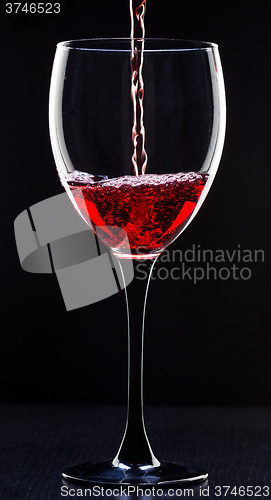 Image of Red wine pouring