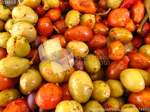 Image of green olives and hot peppers