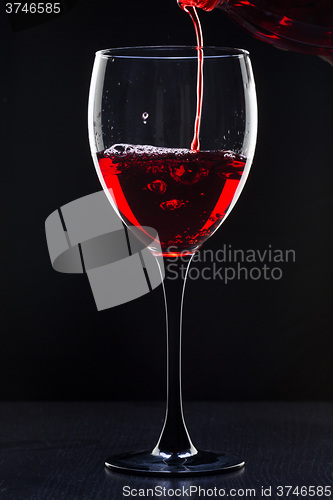 Image of Red wine pouring