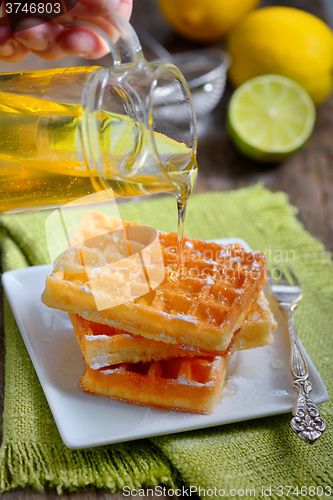 Image of waffles with honey and lemon