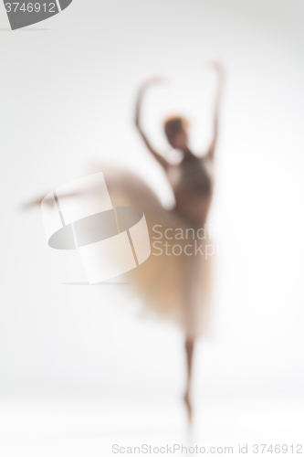 Image of Blurred silhouette of ballerina on white background