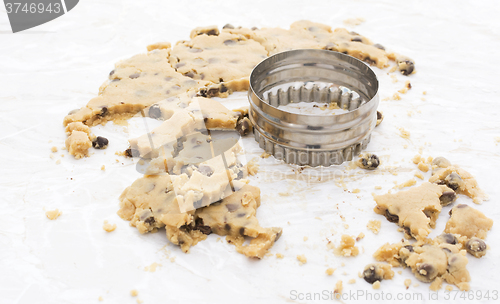 Image of Cookie cutter with chocolate chip dough