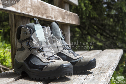 Image of Grey hiking shoes on a bench