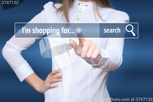 Image of Woman click on virtual e-shop button. E-commerce and B2C concept. i shopping for