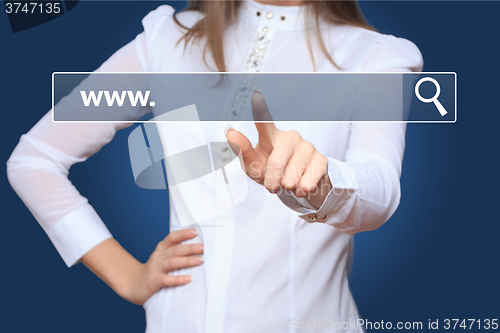 Image of Young woman touching web browser address bar with www sign