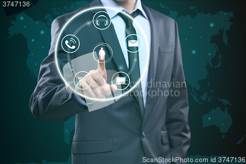 Image of Touching Contact Us Concept on Visual Screen. Businessman pressing button