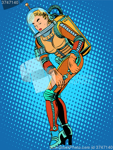 Image of Sexy beautiful girl astronaut in a spacesuit
