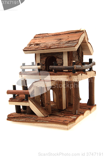 Image of natural wooden house toy 