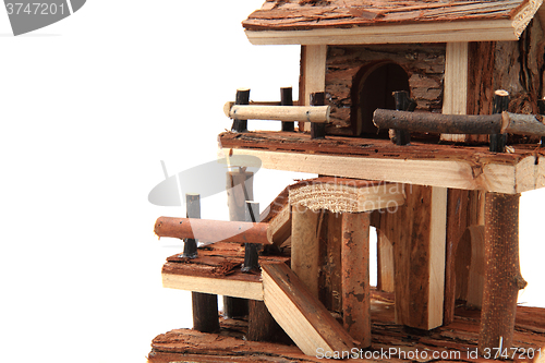 Image of natural wooden house toy 