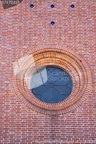 Image of rose window  italy  lombardy     in  the sumirago old     brick 