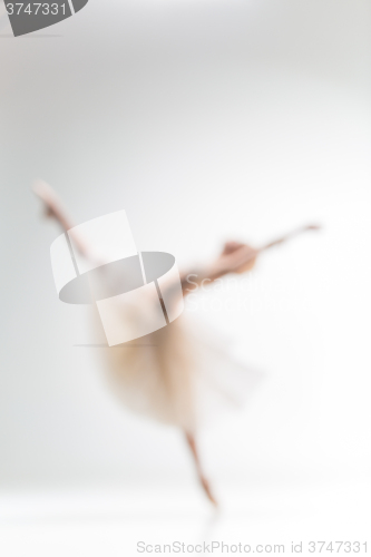 Image of Blurred silhouette of ballerina on white background