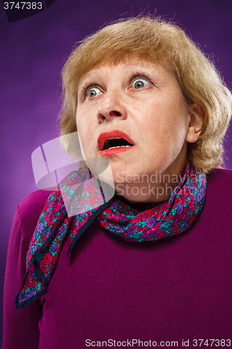 Image of The frightened senior woman