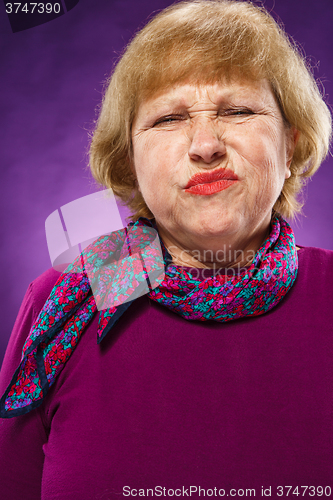 Image of The portrait of a disaffected senior woman 