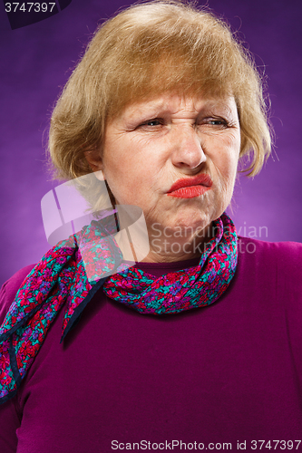 Image of The portrait of a disaffected senior woman 