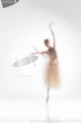 Image of Blurred silhouette of ballerina on white background