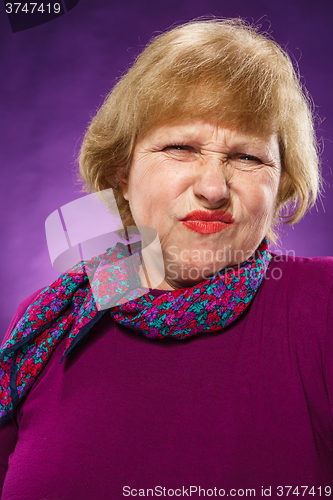 Image of The portrait of a disaffected senior woman 