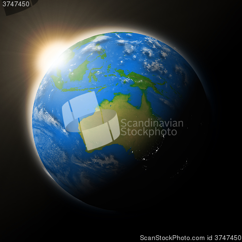 Image of Sun over Australia on planet Earth