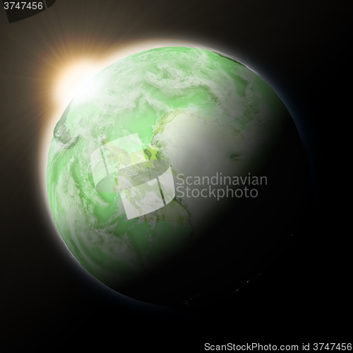 Image of Sun over Antarctica on green planet Earth