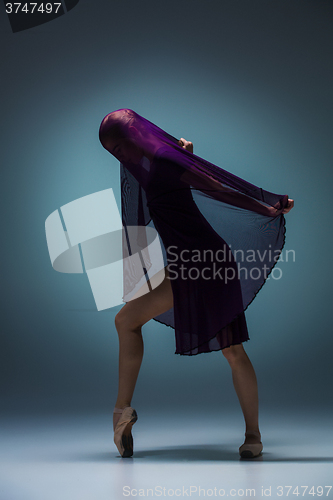 Image of The beautiful ballerina dancing with blue veil