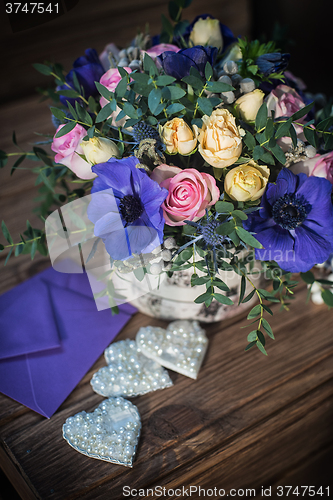 Image of beautiful bouquet flowers and hearts 