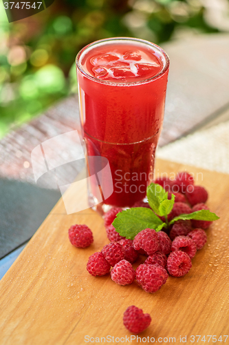 Image of fruit drink with raspberries