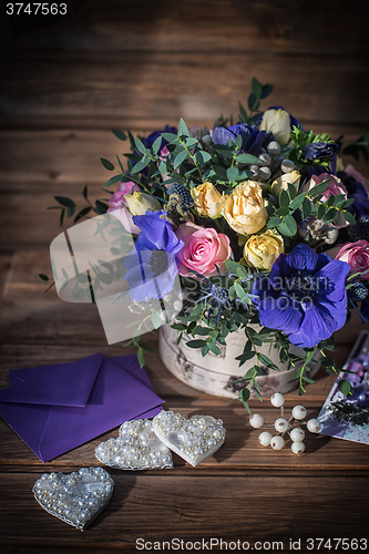 Image of beautiful bouquet flowers and hearts 